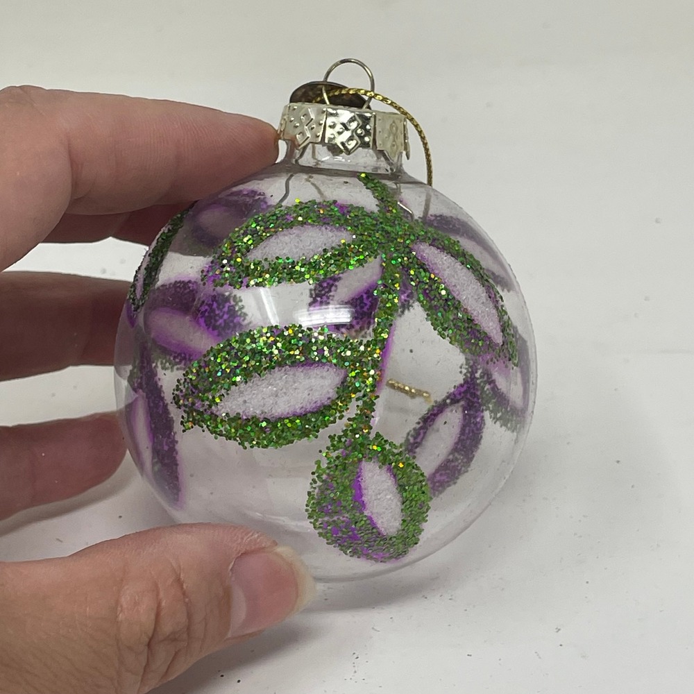 Thomas Pacconi Clear Glass Christmas Ornament Purple Green Glitter Floral 2.75in